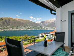 Outdoor dining - Residenza Miralago Apt. A5 by Interhome (Piazzogna)