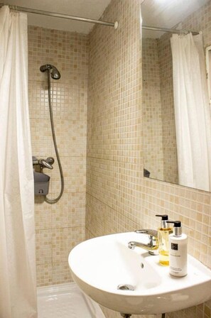 Hair dryer, towels, toilet paper