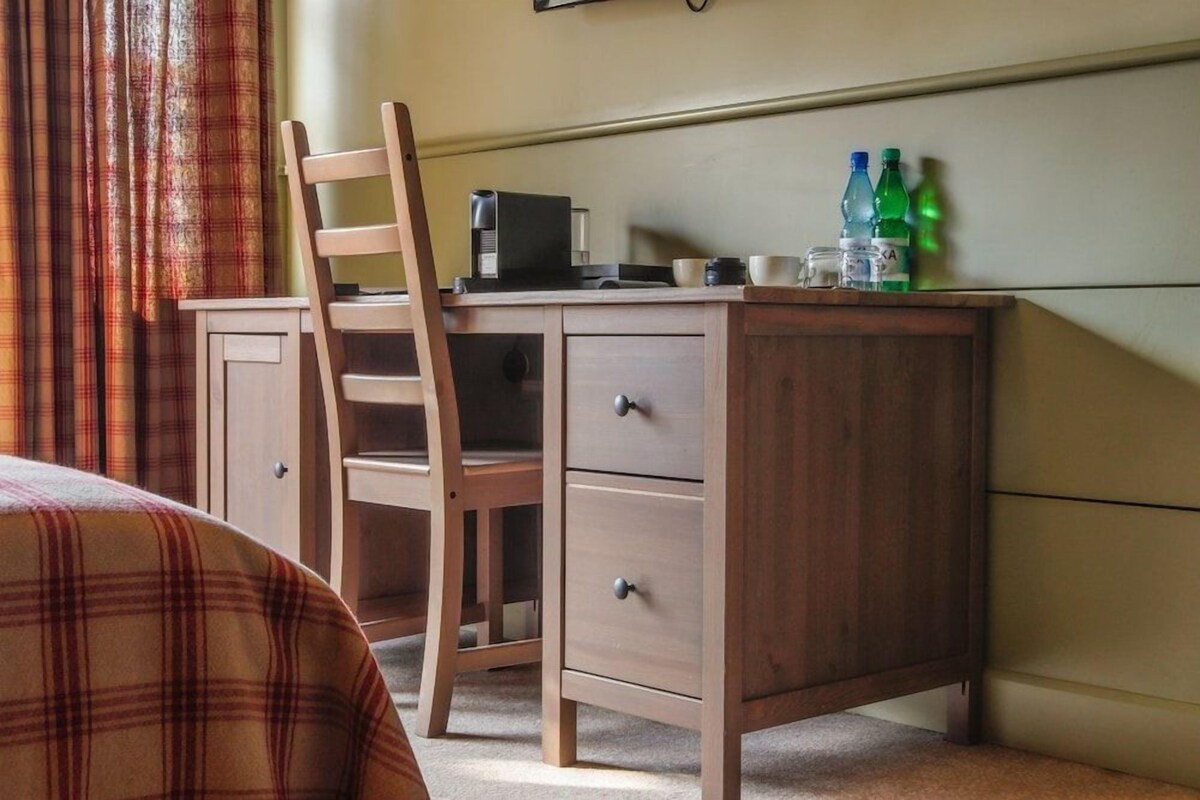 Desk, laptop workspace, iron/ironing board (on request), free WiFi