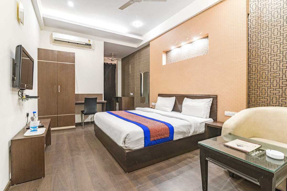 Habitación doble Deluxe | Ropa de cama de alta calidad, camas con efecto memoria y minibar 