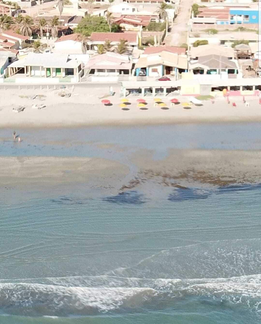 Na praia, areia branca 