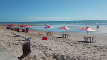 On the beach, white sand