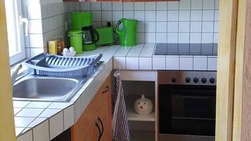 Apartment | Private kitchen | Fridge, oven, stovetop, cookware/dishes/utensils