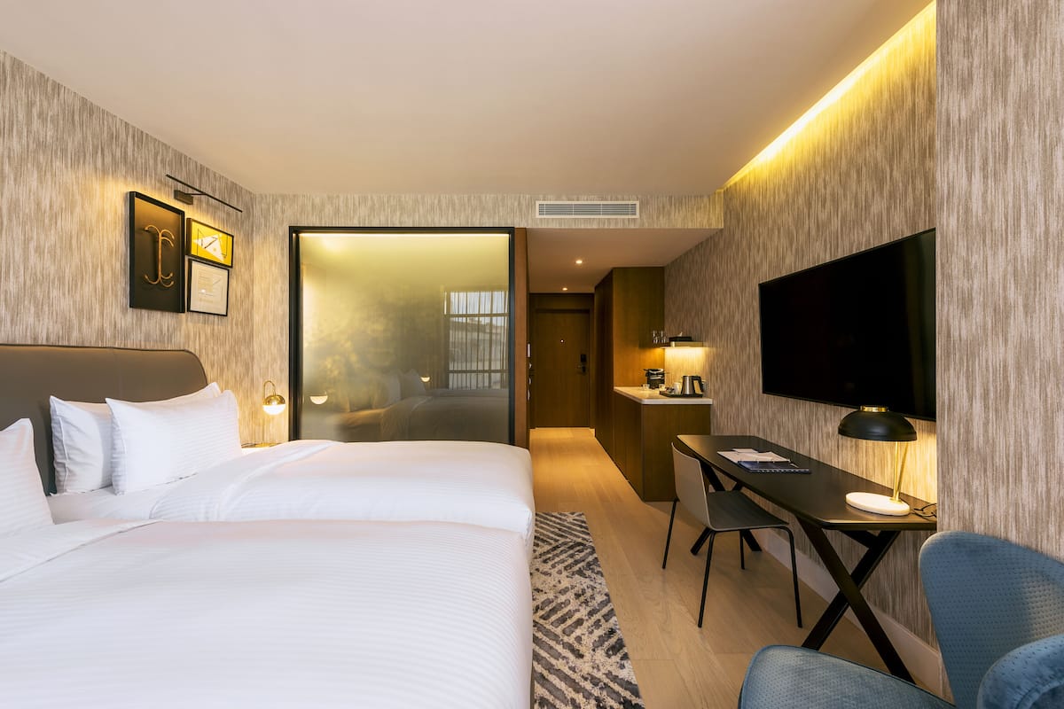Premium bedding, down duvets, memory-foam beds, minibar