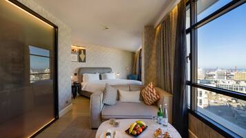 Premium bedding, down comforters, memory foam beds, minibar