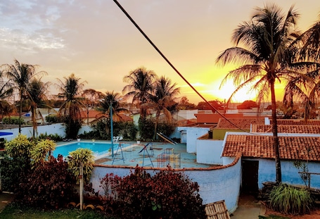 Outdoor pool, open 6:00 AM to 10:00 PM, pool umbrellas, sun loungers