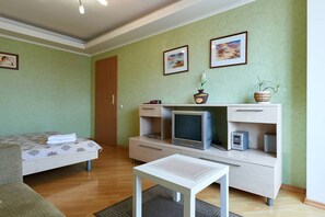 Apartemen, 1 kamar tidur | 1 kamar tidur, setrika/meja setrika, Wi-Fi gratis, dan seprai linen