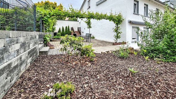 A white building with a sign reading "Ferienwohnungen". - Zum Trichter by Interhome (Palzem)