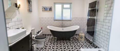 Apartment | Bathroom | Separate tub and shower, deep soaking tub, hair dryer, towels