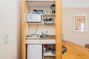 Departamento (0 Bedroom) | Cocina privada | Parrilla de estufa y cafetera de espresso 