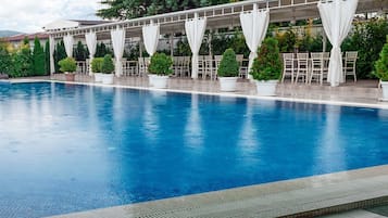 Indoor pool, seasonal outdoor pool, pool umbrellas, sun loungers