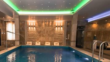 Indoor pool, seasonal outdoor pool, pool umbrellas, sun loungers