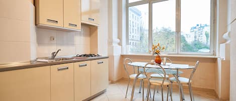 Apartment | Private kitchen | Full-sized fridge, microwave, stovetop, cookware/dishes/utensils