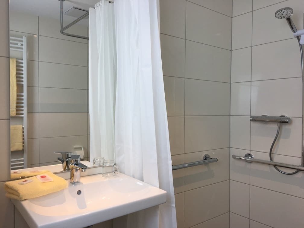 shower, free toiletries, hair dryer, towels