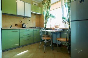 Apartment | Private kitchen | Fridge, microwave, stovetop, electric kettle