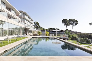 Outdoor pool, open 9:00 AM to 9:00 PM, pool umbrellas, sun loungers