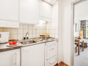 Fridge, oven, cookware/dishes/utensils