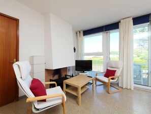 Televisión, chimenea