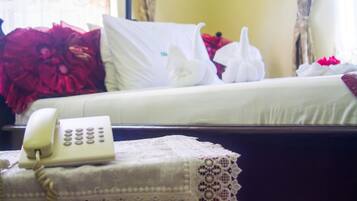 Blackout drapes, iron/ironing board, free WiFi, bed sheets