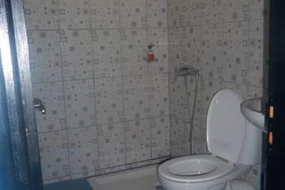 Shower, rainfall showerhead, towels, soap