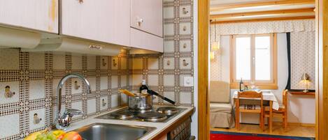 Fridge, oven, cookware/dishes/utensils