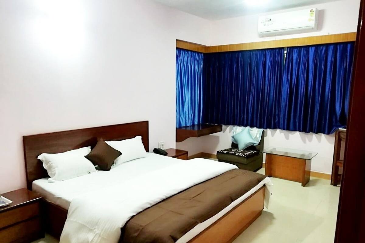 Individually furnished, desk, laptop workspace, rollaway beds