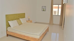 Unclassified image, 5 of 16, button - Malom Center Apt 2 (Dakar)