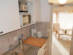 Fridge, microwave, oven, cookware/dishes/utensils