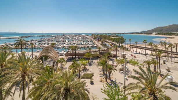 A coastal resort with a marina, palm trees, and a beach. - Nautic 3 by Interhome (Port d'Alcúdia)