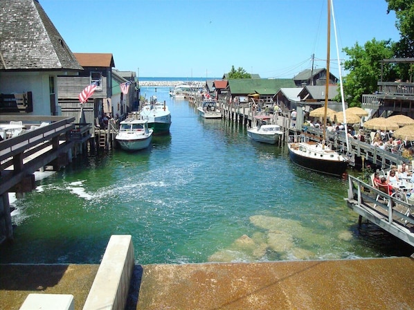 Guests can enjoy waterfront dining and socializing at this lively riverside dock area.