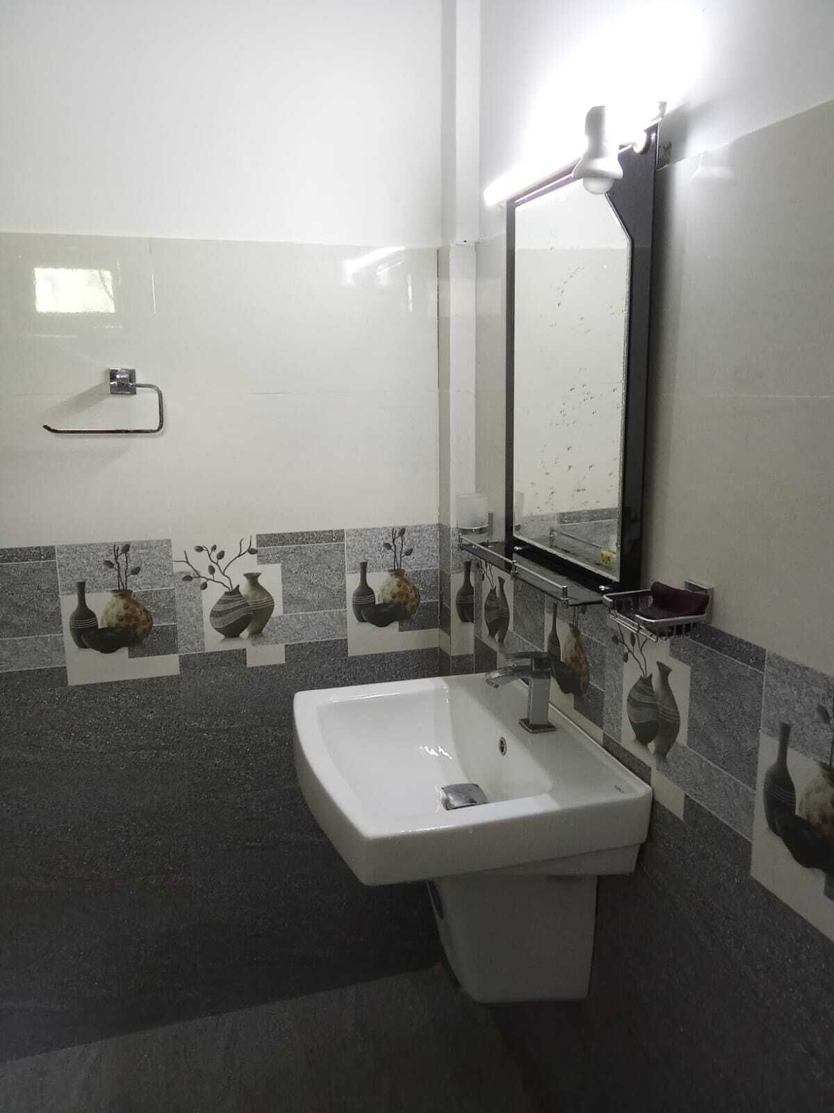 Habitación Confort | Baño | Ducha y cabezal de ducha con hidromasaje