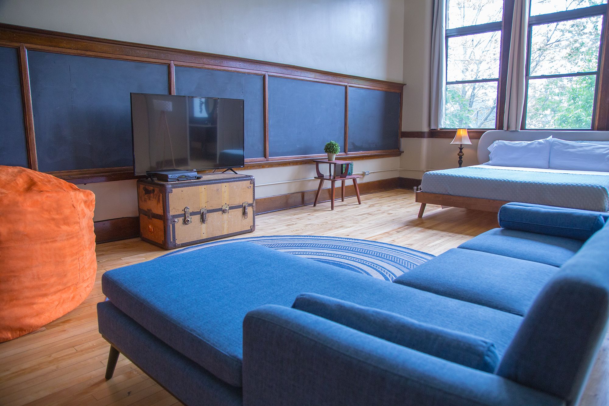 luxury studio suite (209) | living area | 60-inch smart tv with cable channels, tv, first-run films