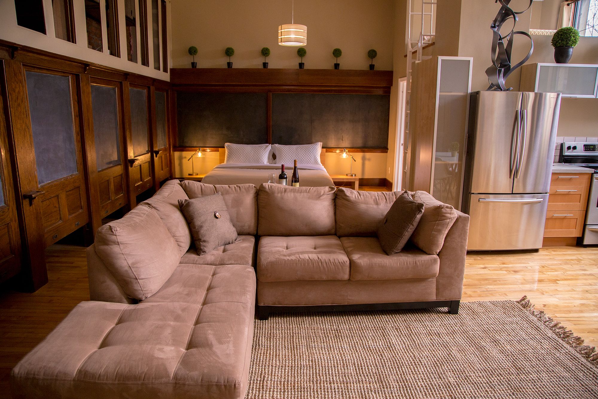 luxury studio suite (210) | living area | 60-inch smart tv with cable channels, tv, first-run films