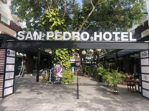 The entrance to the San Pedro Hotel with a sign above the door. - San Pedro Hotel 5ta Avenida (Playa del Carmen)