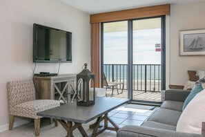 Condo, 2 Bedrooms | Living room | Flat-screen TV - Phoenix II #2023 by Vacasa (Orange Beach)