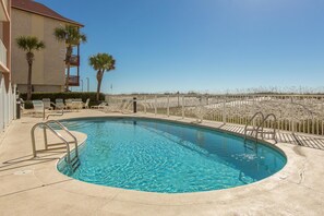 Outdoor pool - Tropic Isle #202 by Vacasa (Gulf Shores)