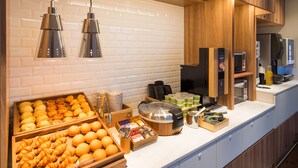 A breakfast buffet with various pastries and beverages. - Super Hotel Anan Tomioka (Anan)