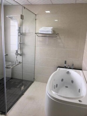 Shower, free toiletries, slippers, towels