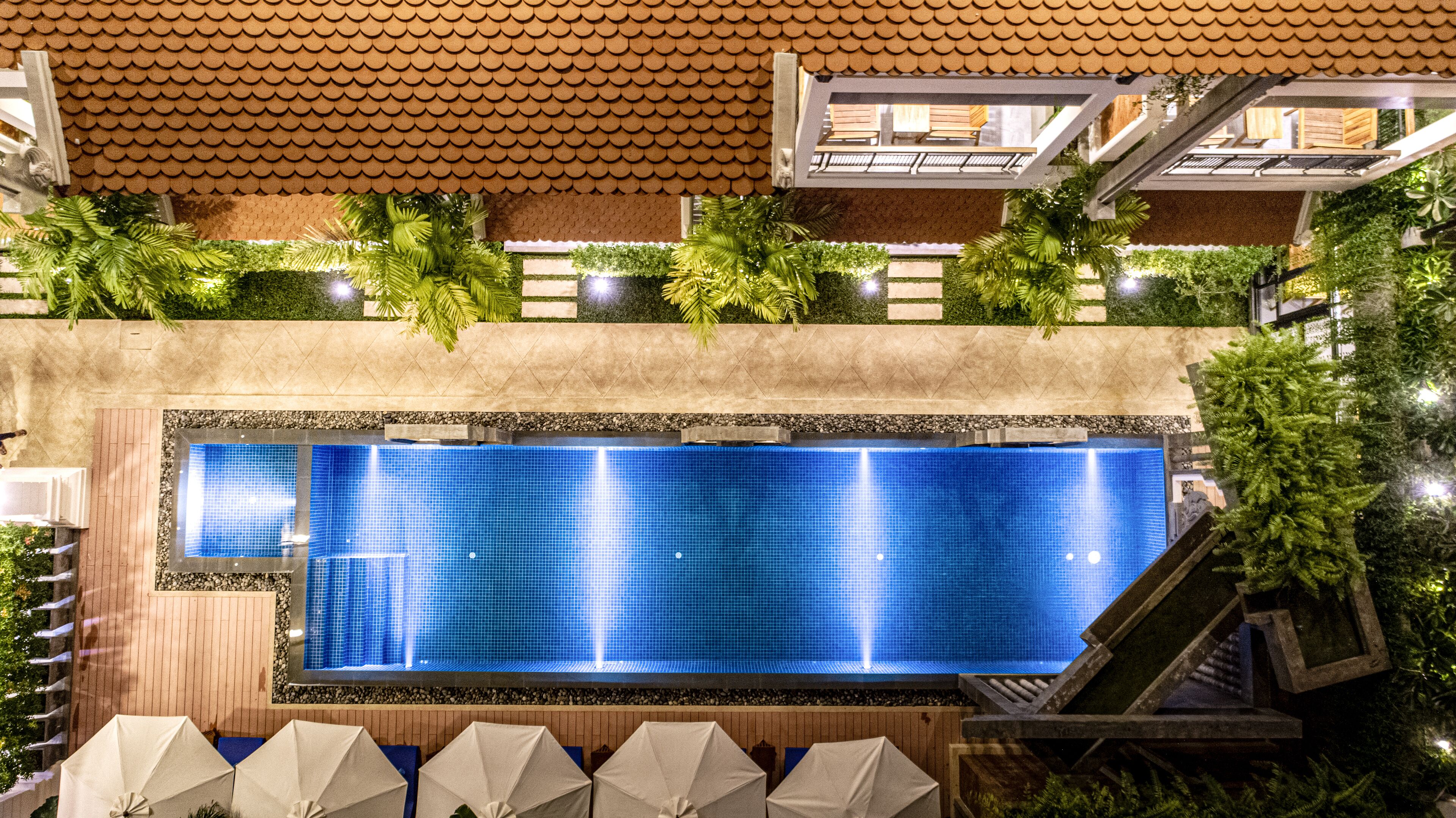 outdoor pool, open 8:00 am to 10:00 pm, pool umbrellas, pool loungers