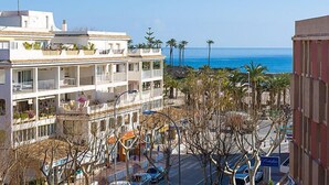 A multi-story building with balconies overlooking a beach. - Galicia Javea by Interhome (Jávea)