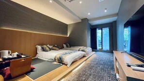 Habitación Deluxe | Ropa de cama de alta calidad y edredón 