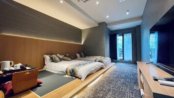 Habitación Deluxe | Ropa de cama de alta calidad, edredones de plumas, caja fuerte