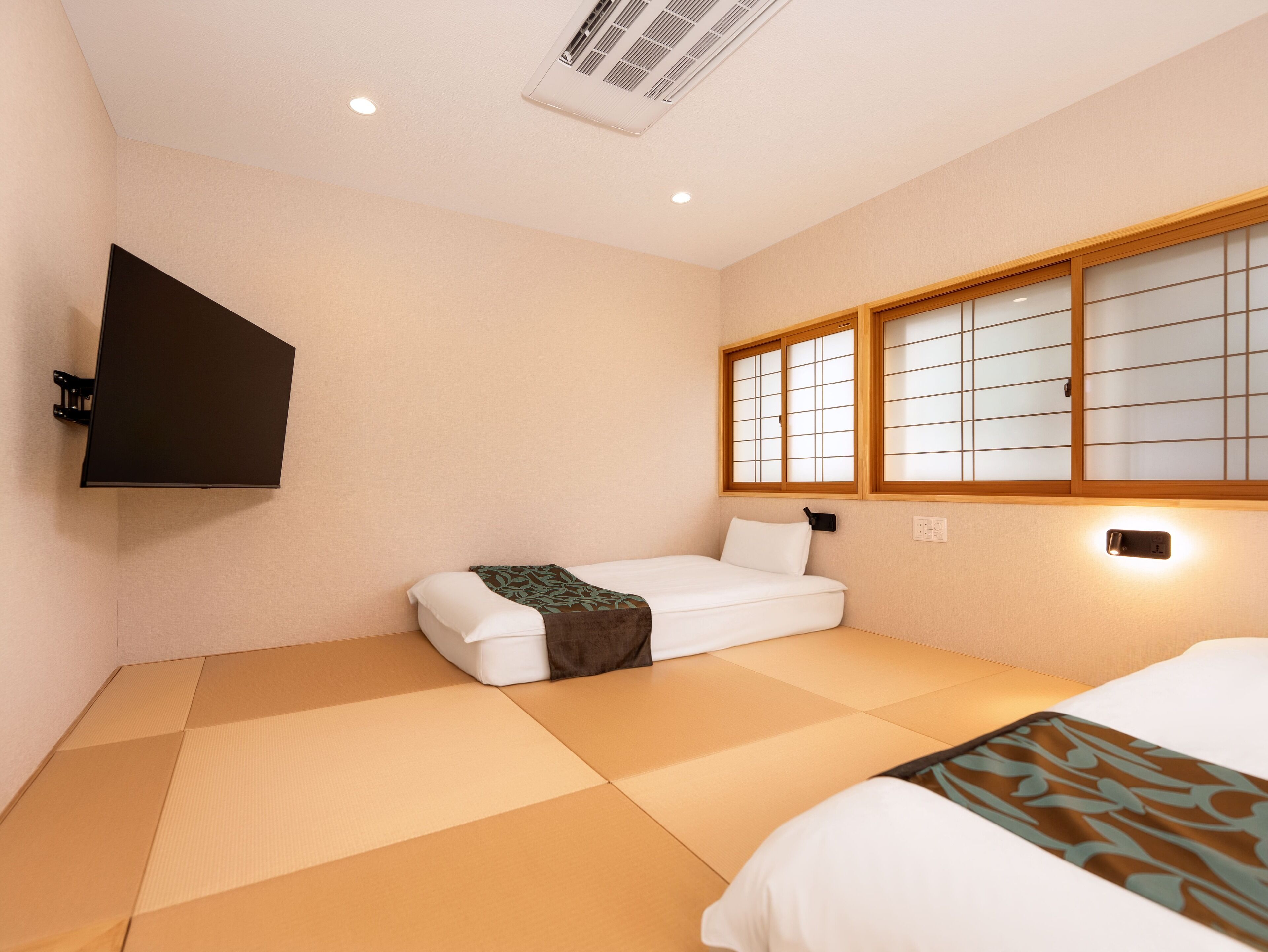 Habitación doble familiar | Caja de seguridad en la habitación y wifi gratis 