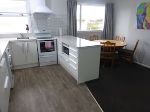 Family House, 3 Bedrooms | Private kitchen | Full-size fridge, microwave, oven, stovetop
