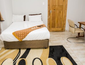 Quarto quádruplo | Ferros/tábuas de passar roupa, berços (sobretaxa), Wi-Fi de cortesia