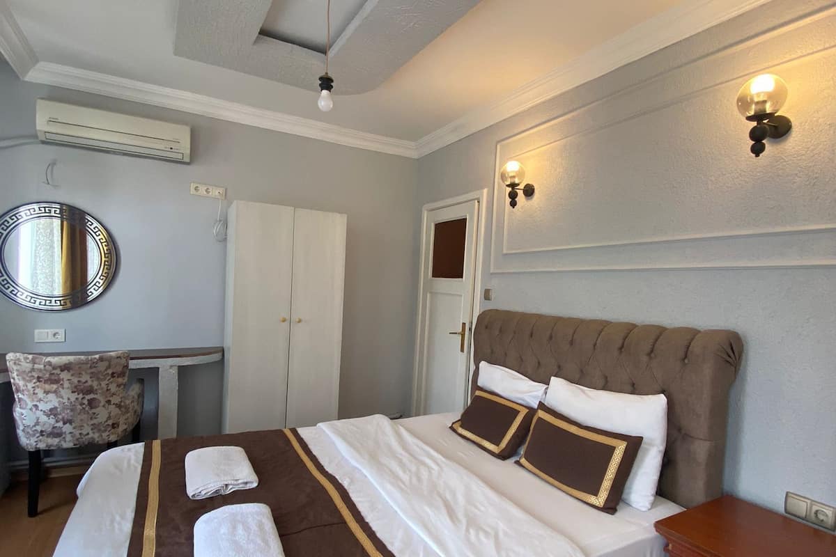 Premium bedding, blackout curtains, iron/ironing board, free WiFi