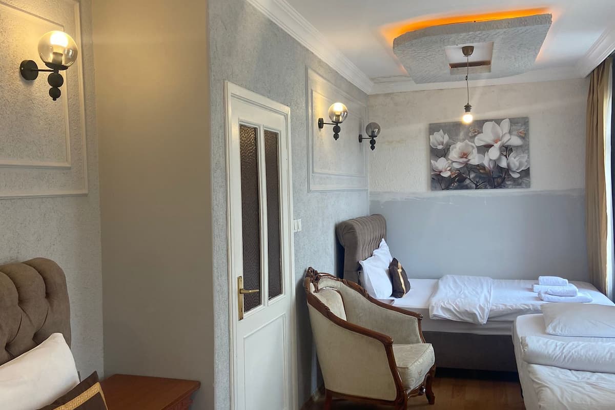 Premium bedding, blackout curtains, iron/ironing board, free WiFi