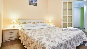 Apartment, 1 Bedroom | 1 bedroom, desk, iron/ironing board, free WiFi