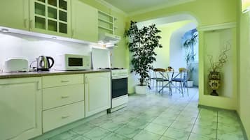 Apartment, 1 Bedroom | Private kitchen | Fridge, microwave, oven, stovetop