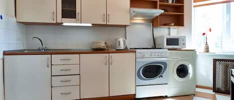 Apartment | Private kitchen | Fridge, microwave, oven, stovetop